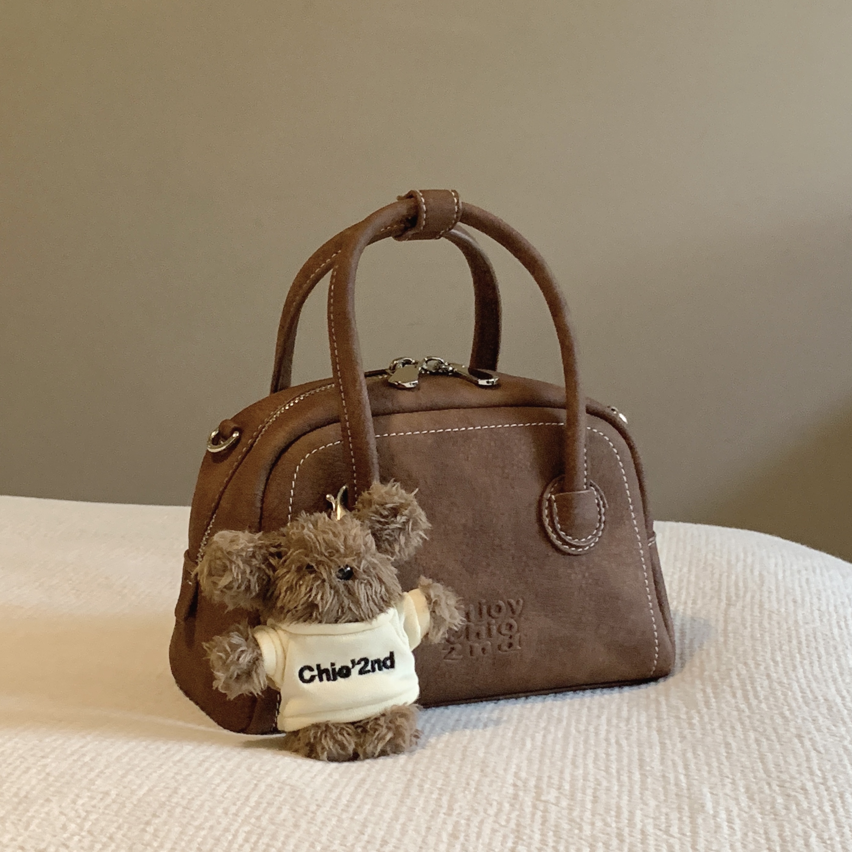 南风Chio2nd 西部旅社枕头包包女式2025新款手提包小拎包斜挎包