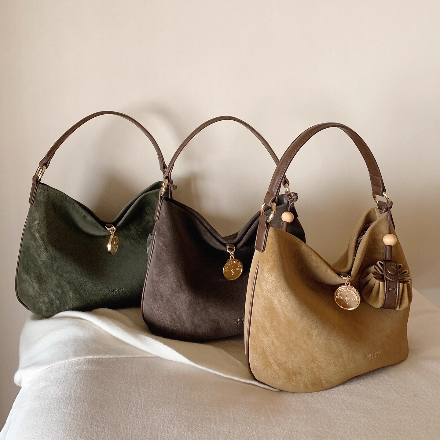 南风Chio2nd 吉袋衔金水桶包2025巨好看包包女新款手提单肩斜挎包 - 图2