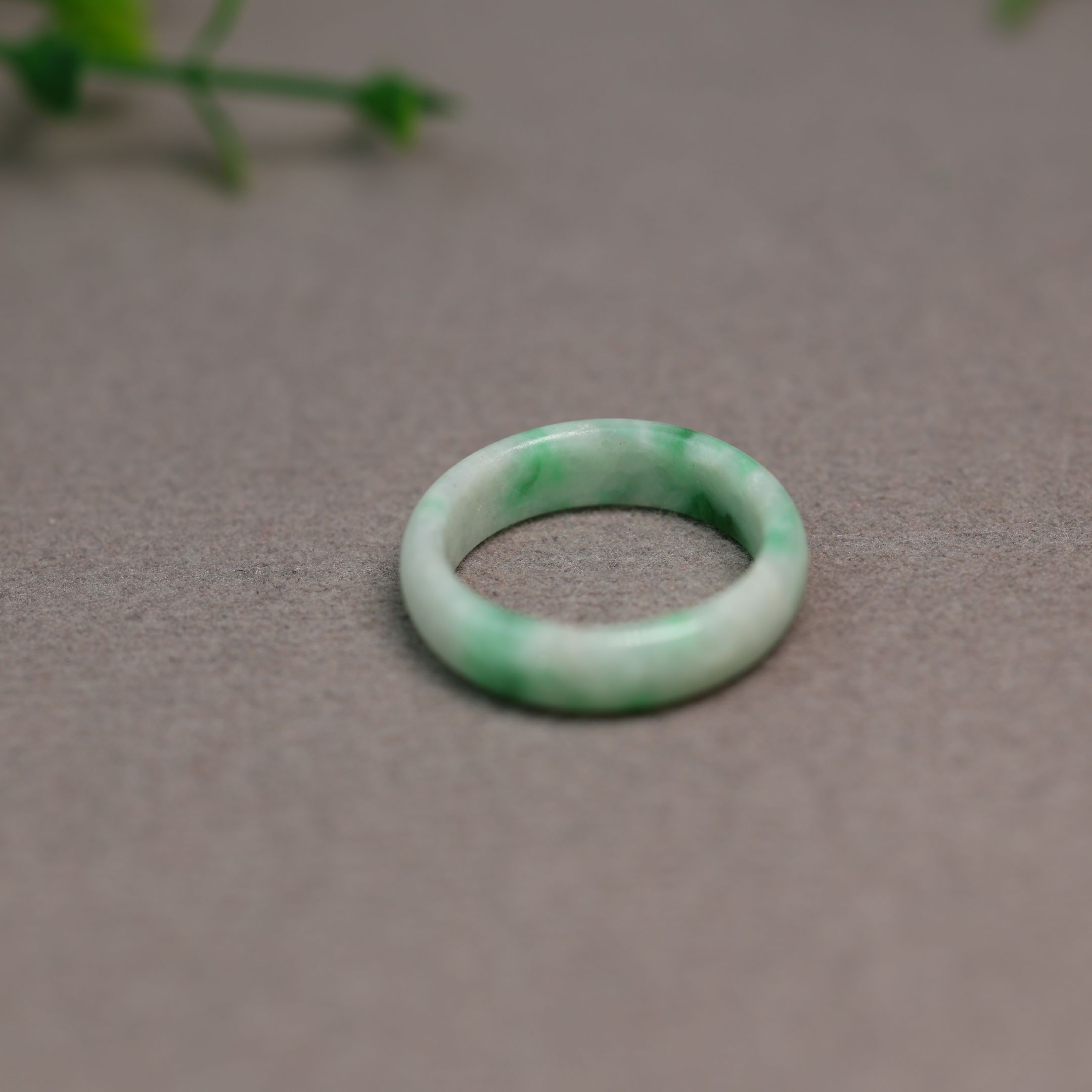 Floating Yang Green Natural Grade A Jadeite Ring on White Background