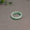 Floating Yang Green Natural Grade A Jadeite Ring on White Background