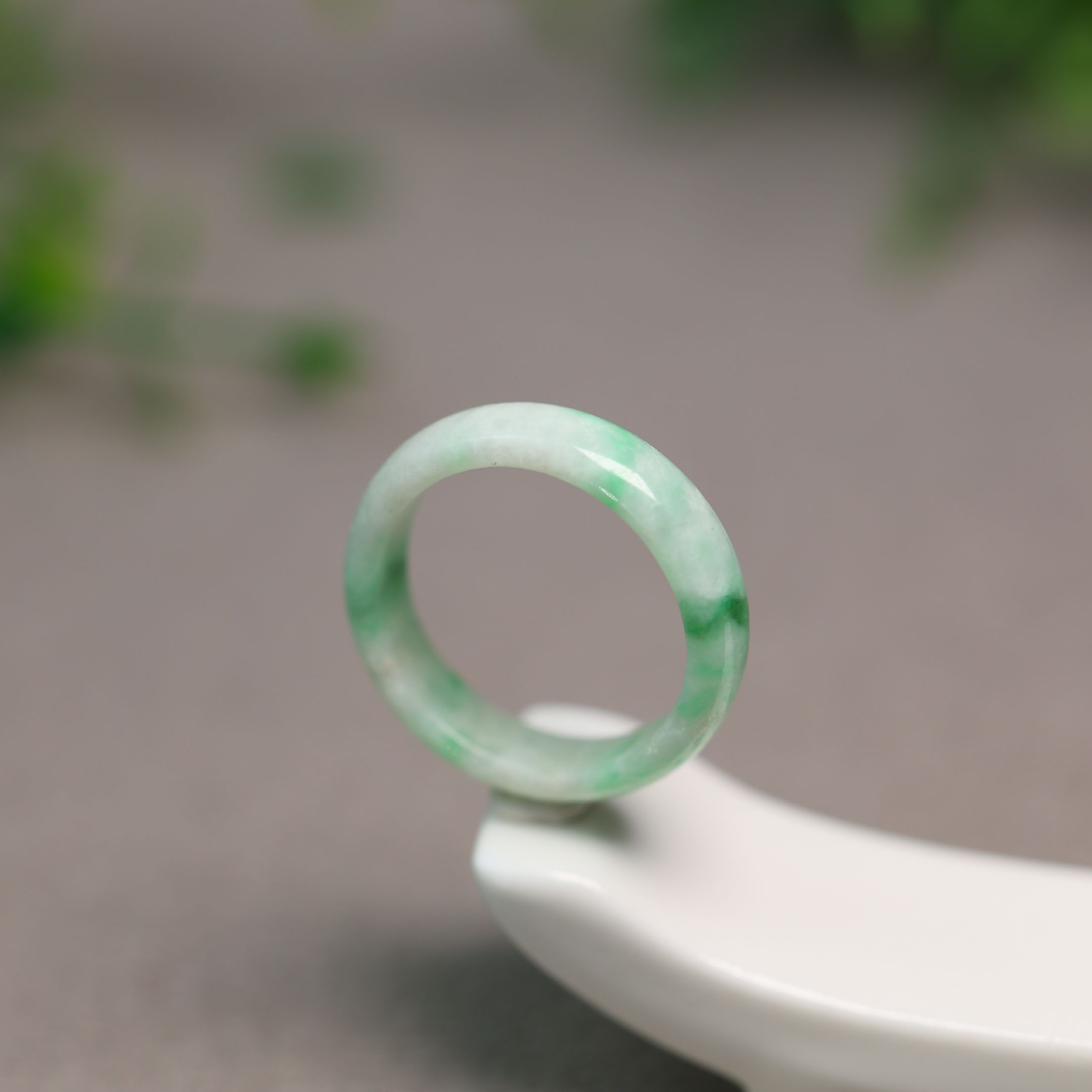 Floating Yang Green Natural Grade A Jadeite Ring on White Background