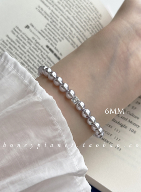 淡紫色施珍珠弹力绳手链原创设计