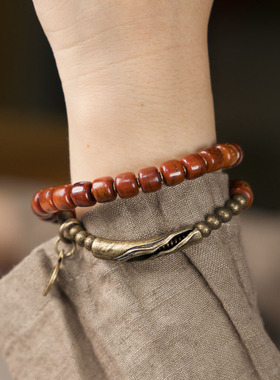 曲尾花藏式烟熏牛骨手链