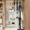 Customized perforated panels inside the cabinet save space and look neat!