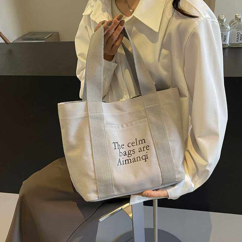 通勤风包包大容斜挎包字母花纹托特包百搭手提包上班时尚校园风,淘宝优惠券,粉丝福利购,淘宝优惠卷