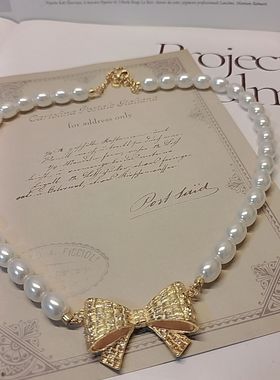 设计师款时尚气质法式复古珍珠蝴蝶结吊坠项链