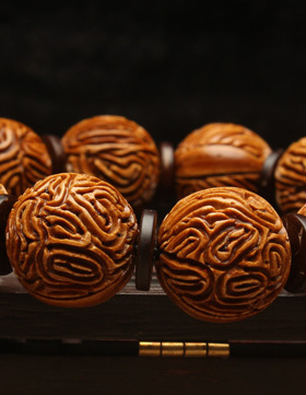 嫣然艺坊桃核手串男女