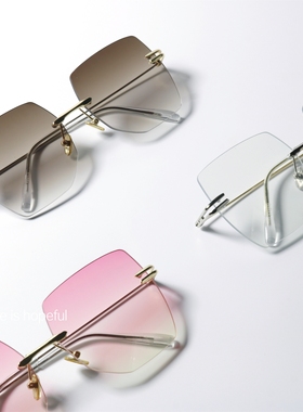 无框水蜜桃色UV400防紫外线墨镜