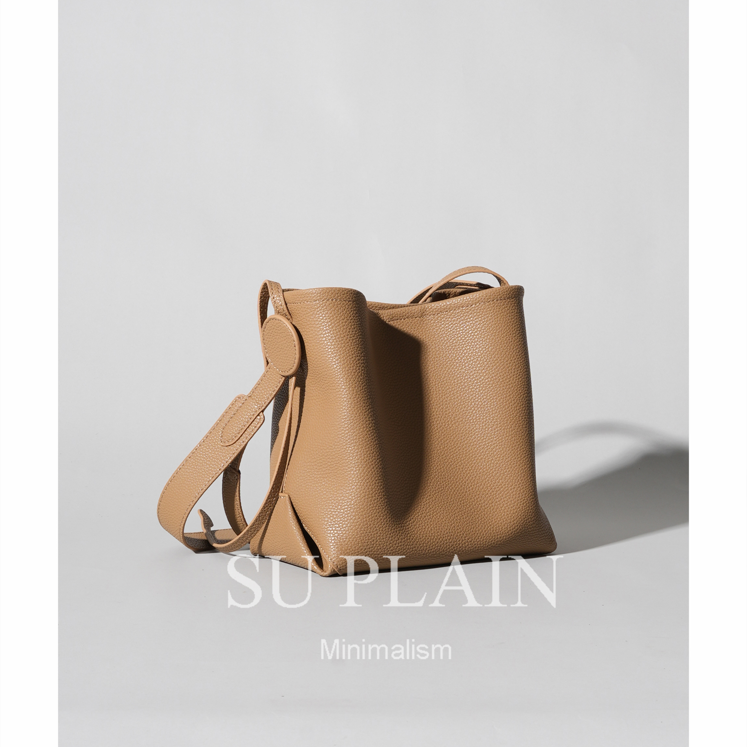 SU PLAIN 水桶包小众设计通勤真皮牛皮女包休闲纯色单肩斜跨包 - 图0