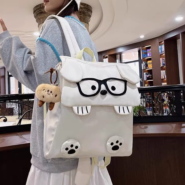 Cute ugly puppy schoolbag Japanese ins female junior high school student niche backpack female college student high school student backpack