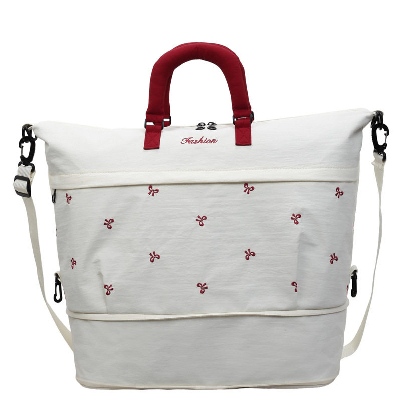 Cross-border high-looking bow-knot large-capacity travel bag luggage bag one-shoulder cotton-filled portable fitness sports boarding bag