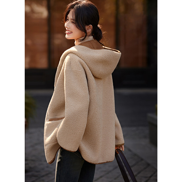 Xinwei ຫນັງປີ້ນກັບກັນໄດ້ແລະ faux fur ເສື້ອ jacket ຫນຶ່ງສິ້ນ