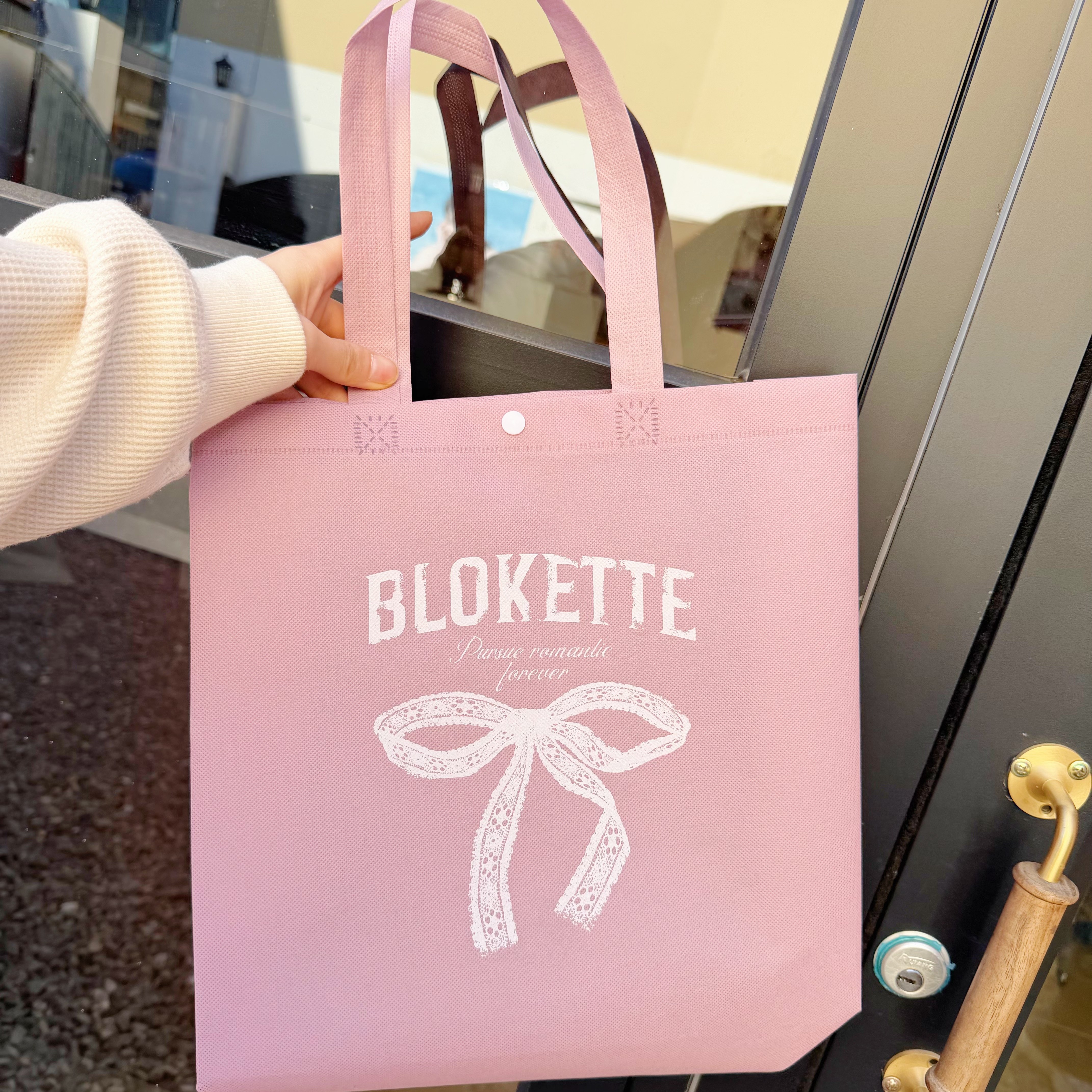 Elegant bow non-woven bag custom-made clothing store bag Internet celebrity hand-held women's shopping bag custom logo