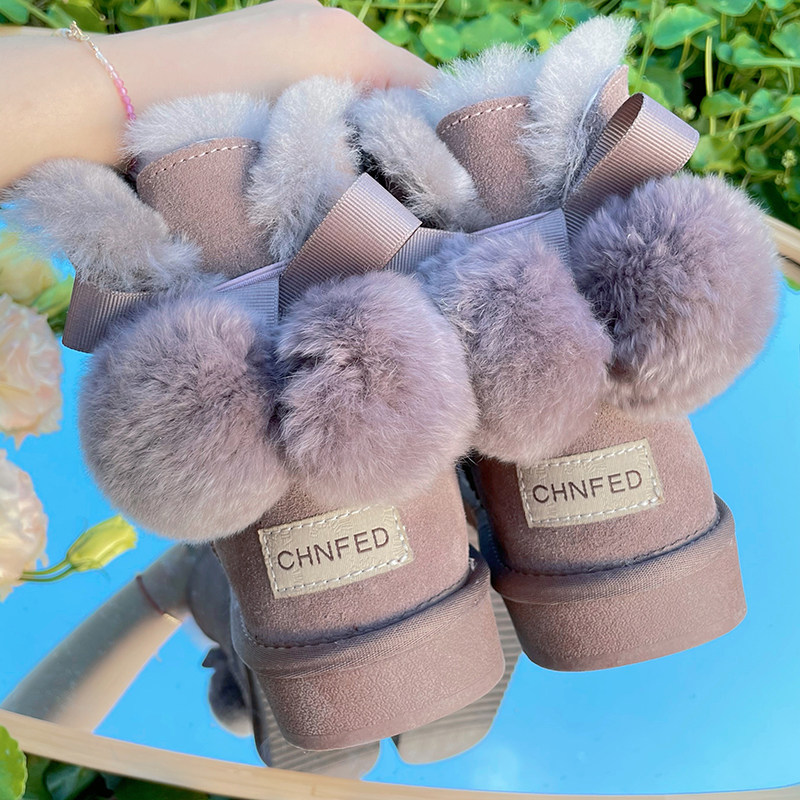 2025冬新款皮毛一体雪地靴女短筒蝴蝶结防滑真皮保暖平底加厚棉靴,淘宝优惠券,粉丝福利购,淘宝优惠卷