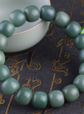 厂家批发阴皮墨绿菩提根桶珠手串