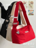 The red crossbody bag is my favorite! Full of energy