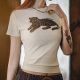 Madden Leopard ເສື້ອທີເຊີດອາເມລິກາ Retro ຫວານຮ້ອນສາວຂວາບ່າສູງແຂນສັ້ນສີຂາວຮອບຄໍກະທັດຮັດເທິງແມ່ຍິງ Summer