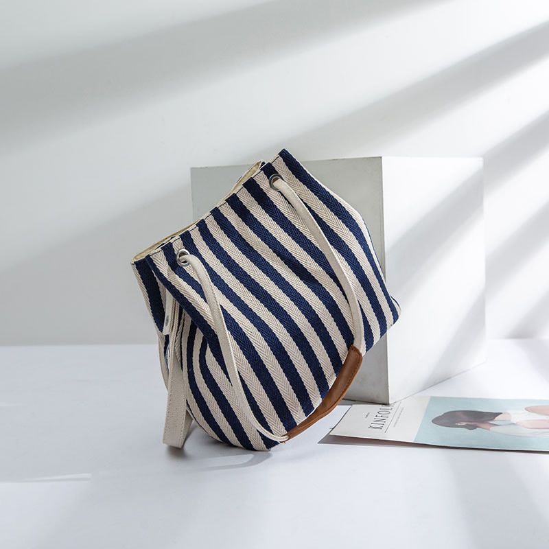 新款帆布条纹斜跨多用包韩版水桶包 小清家便当包店女士包袋