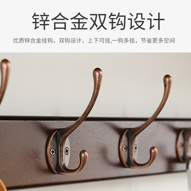 Multifunctional creative clothes rack behind the living room door on the wall