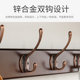 Multifunctional creative clothes rack behind the living room door on the wall