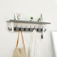 Multifunctional creative clothes rack behind the living room door on the wall