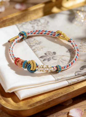 手工桃花编织绳手链黄金转运珠