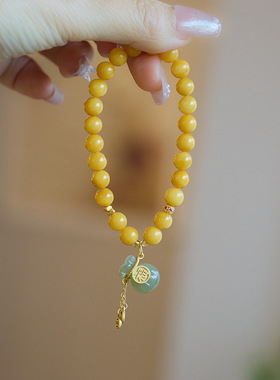 新中式国风天然鸡油黄蜜蜡琥珀手链女和田玉钱袋福袋手串闺蜜礼物