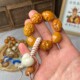 Carved large intestine with ivory fruit and cute hand-twisted garlic cloves