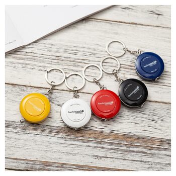 ເທບເທບຄຸນນະພາບເຍຍລະມັນ mini portable keychain tape measure 1.5 ແມັດ metric ເຄື່ອງນຸ່ງຫົ່ມວັດໄມ້ບັນທັດອັດຕະໂນມັດ clamping ໄມ້ບັນທັດ