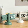 Simple mechanical page-turning clock for living room with wonderful engraving