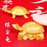 Годовой, хватаясь за Чжурной Черепах, памятный ребенок, наступающий на золотую черепаху тысячелетие китайского чистого ремесленного мастерства, чтобы поймать недельное украшение дня рождения