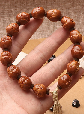 小籽铁核纯手工雕刻财弥地主头手持款招财文玩把件易包浆老核短圆