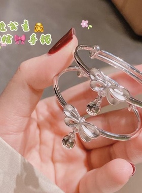 足银999纯银在逃公主蝴蝶结手镯儿童小孩满月宝宝铃铛童镯女一对