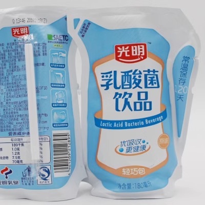 5月新货光明牛奶乳酸菌饮品180ml 24袋整箱团购原味营养早餐包邮-图2