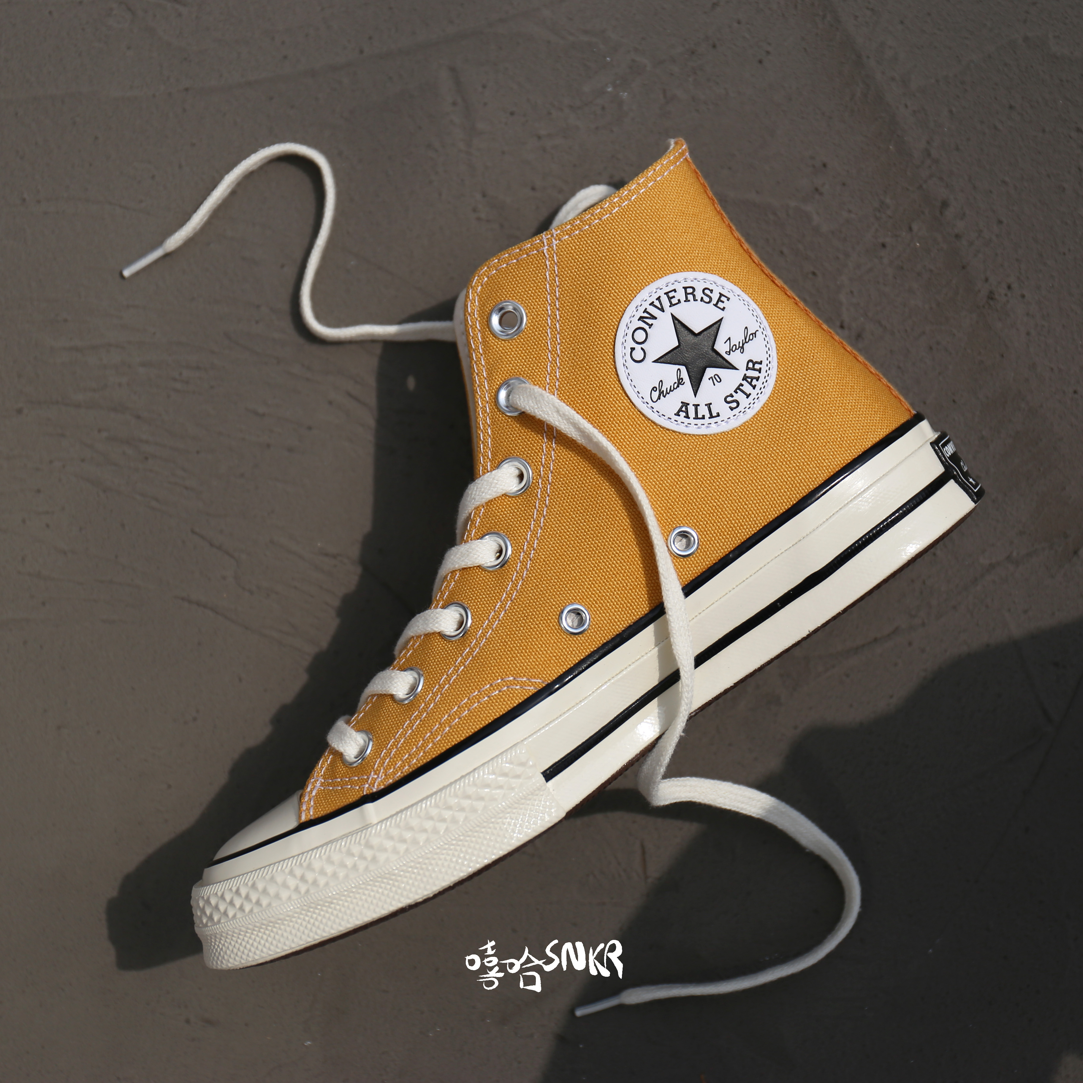 yellow canvas shoes