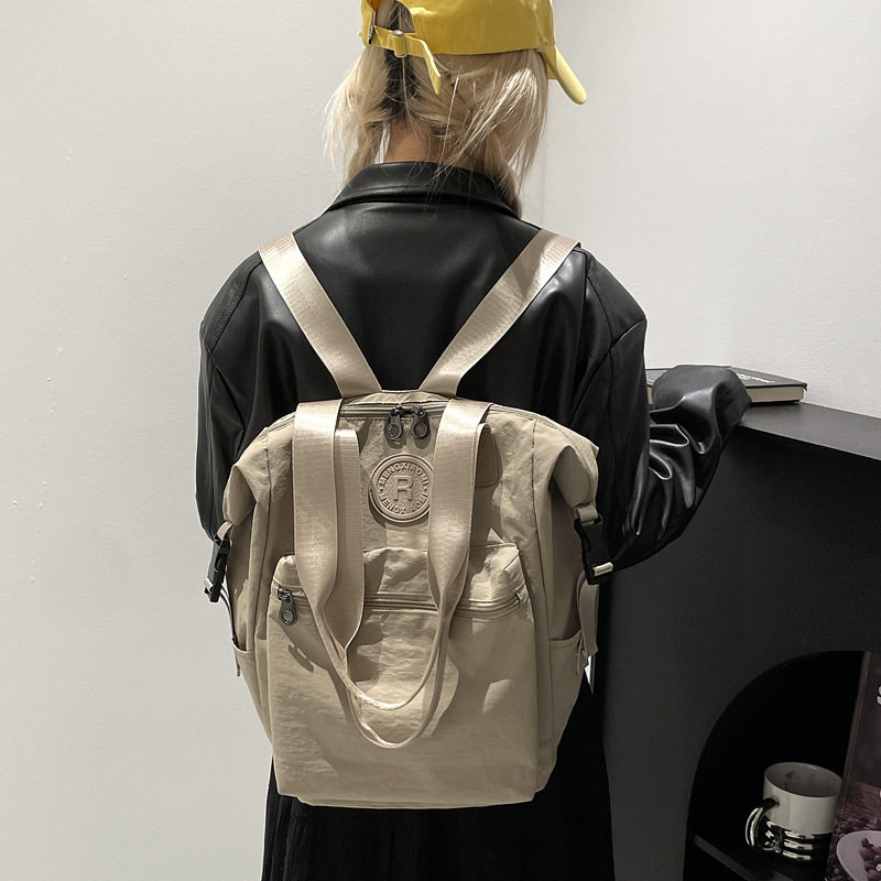 韩版防水多功能双肩包2025情侣款尼龙布时尚运动背包大容量女书包,淘宝优惠券,粉丝福利购,淘宝优惠卷