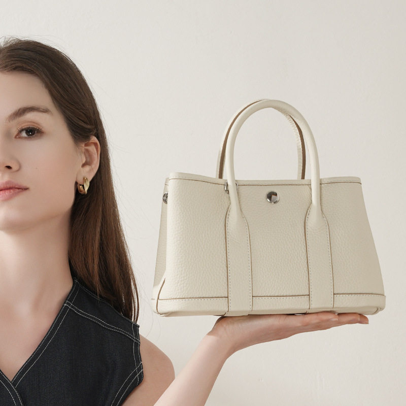 头层TC牛皮花园包真皮女包2025欧美新款复古水桶包时尚手提女包,淘宝优惠券,粉丝福利购,淘宝优惠卷