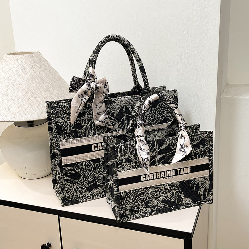 高级感手提刺绣女包帆布托特包女包2025新款潮大容量通勤包单肩包,淘宝优惠券,粉丝福利购,淘宝优惠卷