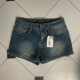 ເດັກຍິງຮ້ອນອາເມລິກາ retro ສັ້ນ denim distressed ສໍາລັບແມ່ຍິງ 2024 summer ການອອກແບບໃຫມ່ ແອວຕ່ໍາ slimming pants ຮ້ອນ