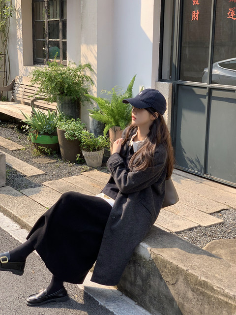 This is a mid-length woolen jacket