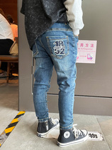 Boys denim small foot Skinny version of pencil pants 2024 Spring loaded with new minimalist baby children long pants tide