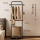 Multifunctional floor-standing clothes hanger with upper and lower storage