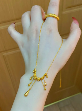 轻奢时尚水滴猫眼流苏项链女简约百搭金色爆闪蹦迪珠灵动感项链