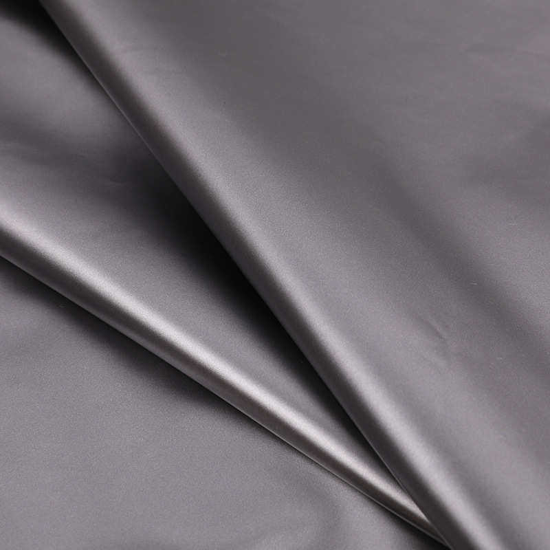 亮面离型纸羽绒服面料 亮面pu羽绒服面料防水布料 春亚纺棉服面料,淘宝优惠券,粉丝福利购,淘宝优惠卷