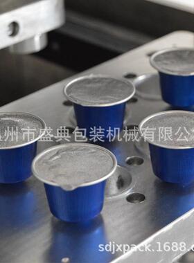 热销盛典37mm咖啡胶囊杯一出九高产量台式气动封口机（全国包邮）
