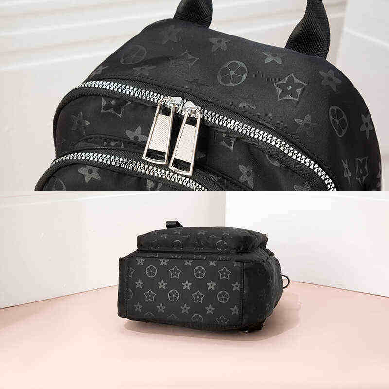 高级感牛津布双肩背包女2025新款时尚书包轻便印花防水旅行包包潮,淘宝优惠券,粉丝福利购,淘宝优惠卷