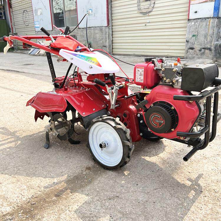 173 Diesel air-cooled four-wheel drive micro tillage machine, mountain small agricultural hand-held rotary tiller, ditching and ridging machine price