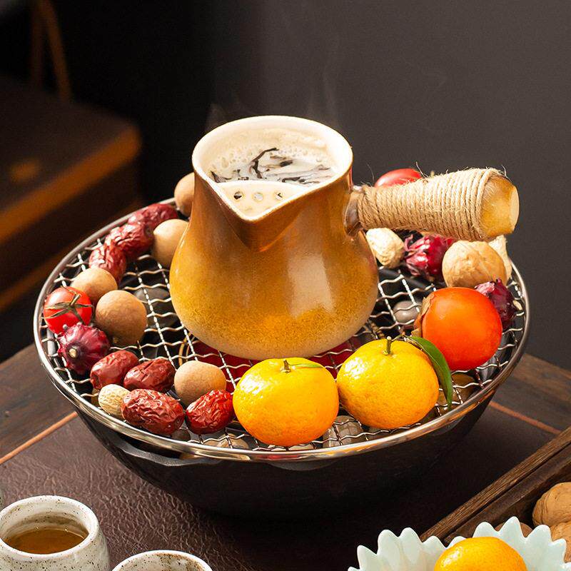 Cooking tea around the stove, household living room tea stove, health-preserving teapot, tea set, black crystal stove, tea set, special