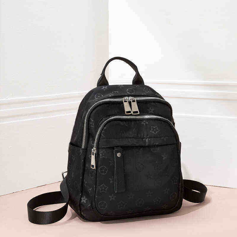 高级感牛津布双肩背包女2025新款时尚书包轻便印花防水旅行包包潮,淘宝优惠券,粉丝福利购,淘宝优惠卷