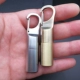 Mini dầu hỏa carabiner siêu nhỏ cá tính sáng tạo bánh xe di động nhỏ móc chìa khóa ngoài trời không thấm nước nam - Bật lửa quẹt khò Bật lửa
